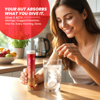 Woman taking a supplement with a glass of water in a kitchen setting, promoting Ayu ACV Dige.