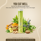 Ayu Daily Green Plus supplement bottle with greenery and superfoods on a beige background