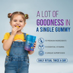 Child holding a kids multivitamin gummies supplement with text about its benefits on a light blue background